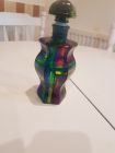 small swirly 6 sided bottle with glass stopper