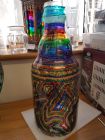 large coin bottle chunky glass with chakra stripes and whirls