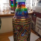 large coin bottle chunky glass with chakra stripes and whirls