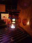 large stemmed glass lantern with chakra stripes and hearts painted with Reiki love &amp; healing
