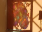 sugar skull painting on glass box frame shadow